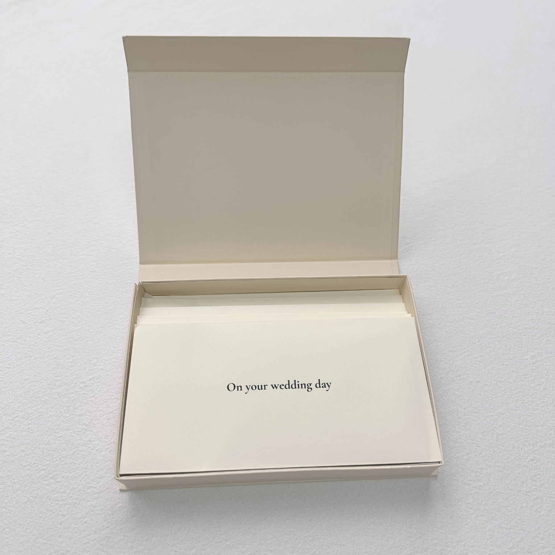 Open Life Letters box on a white background